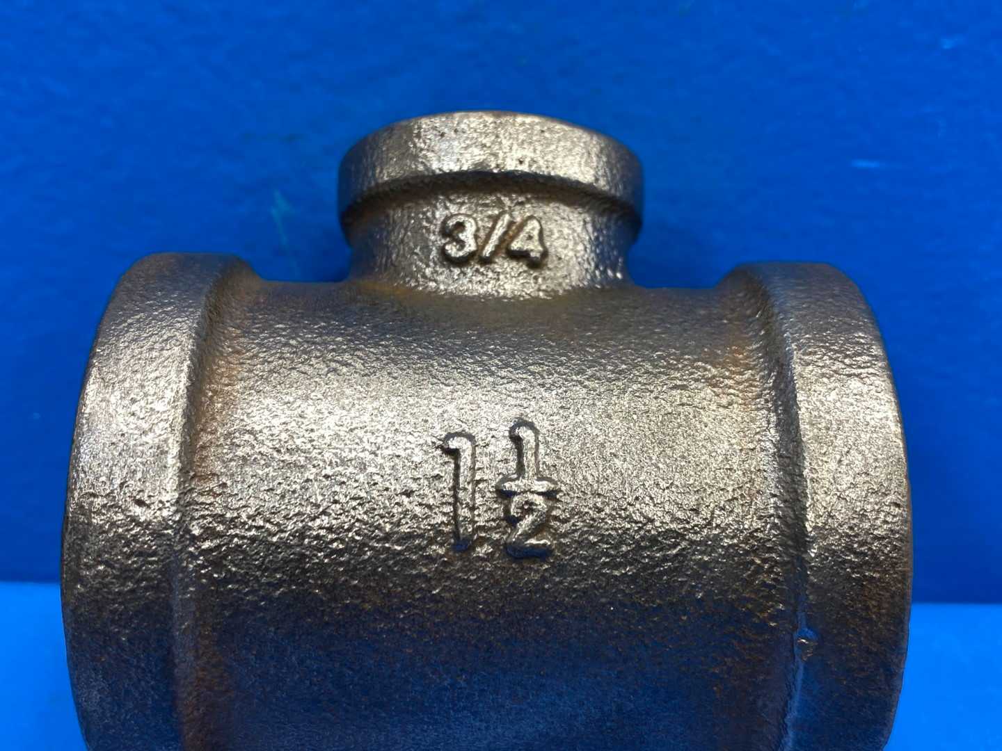 1-1/2" x 1-1/2" x 3/4" F-NPT 150 lb. Black Malleable Iron Reducing Tee (466384)