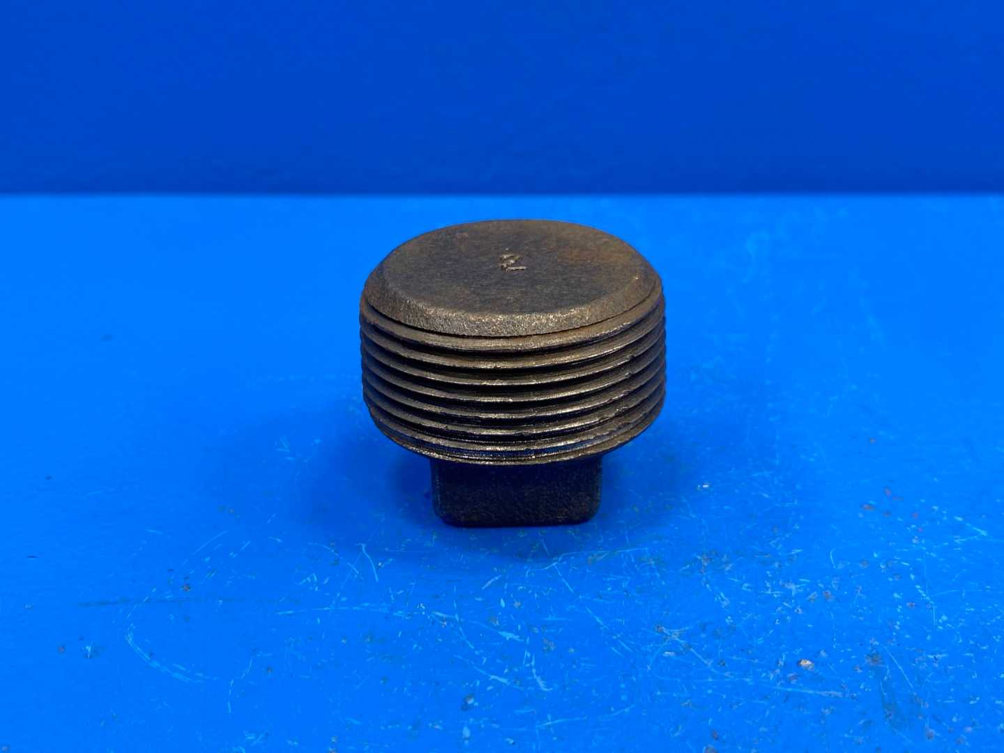 1-1/4" NPSC 150 lb. Black Cast Iron Square Solid Pipe Plug (66376)