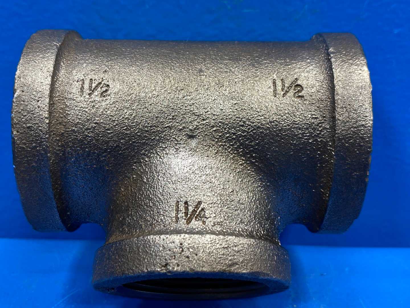 1-1/2" x 1-1/4" x 1-1/2" F-NPT 150 lb. Black Malleable Iron Reducing Tee (466127