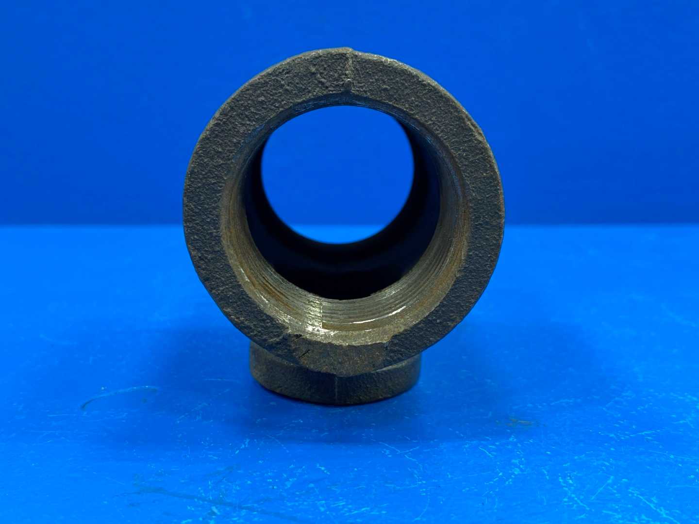 1-1/4" x 1-1/4" x 3/4" F-NPT 150 lb Black Malleable Iron Reducing Tee (466381)