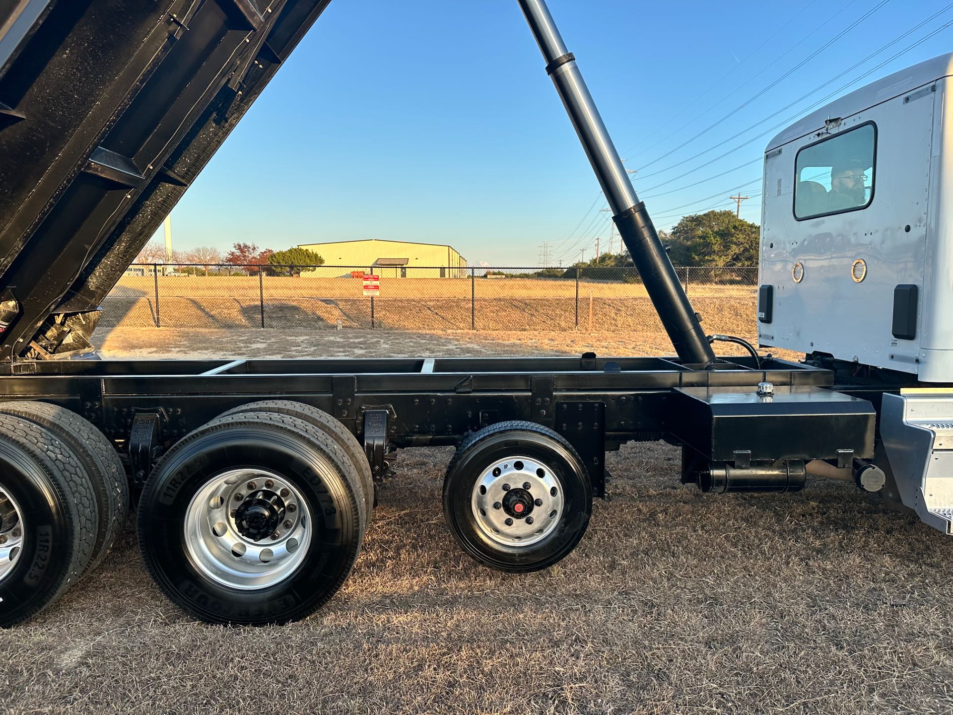 2022 Peterbilt 579 8x4 Tri- Axle Dump Truck 18' Dump Bed w/tarp system