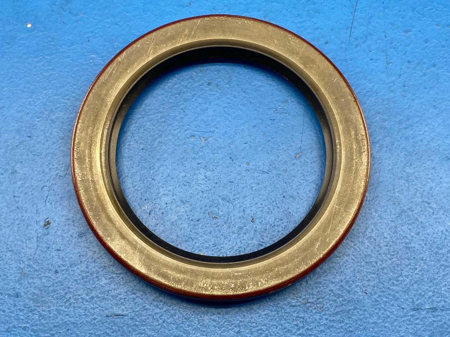 National Oil Seals 455437, Oil Seal, 2.8" ID, 4.0" OD, 0.5" Width, Nitrile Material