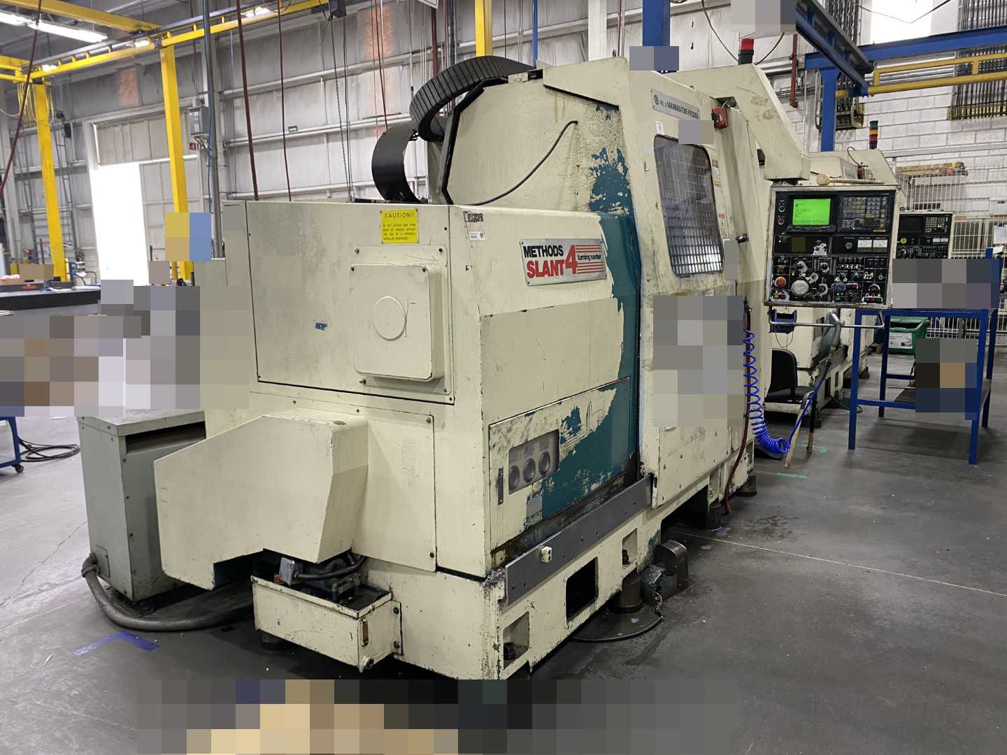 Nakamura-Tome Slant-4B CNC Horizontal Turning Center Fanuc 11T/15-T, 1992, 12" Chuck, 33.86" Swing, 20.47" Over Saddle, 18.31" Turn Dia, 63.38" Z-Travel, 10-Station Turret