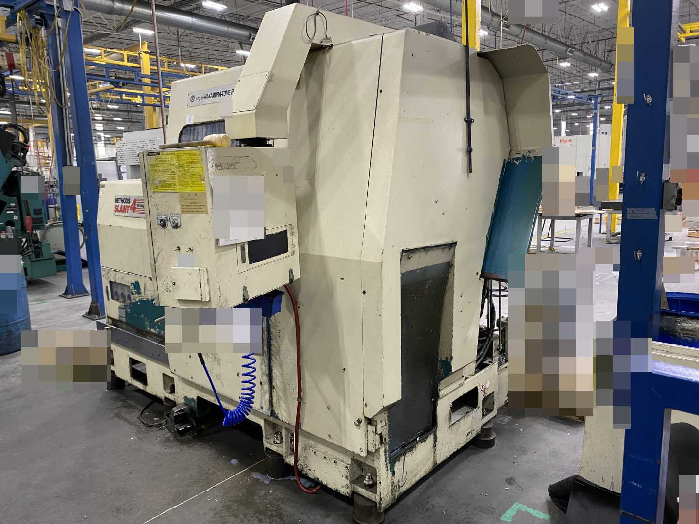 Nakamura-Tome Slant-4B CNC Horizontal Turning Center Fanuc 11T/15-T, 1992, 12" Chuck, 33.86" Swing, 20.47" Over Saddle, 18.31" Turn Dia, 63.38" Z-Travel, 10-Station Turret