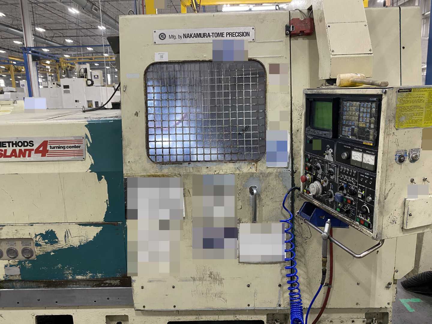 Nakamura-Tome Slant-4B CNC Horizontal Turning Center Fanuc 11T/15-T, 1992, 12" Chuck, 33.86" Swing, 20.47" Over Saddle, 18.31" Turn Dia, 63.38" Z-Travel, 10-Station Turret