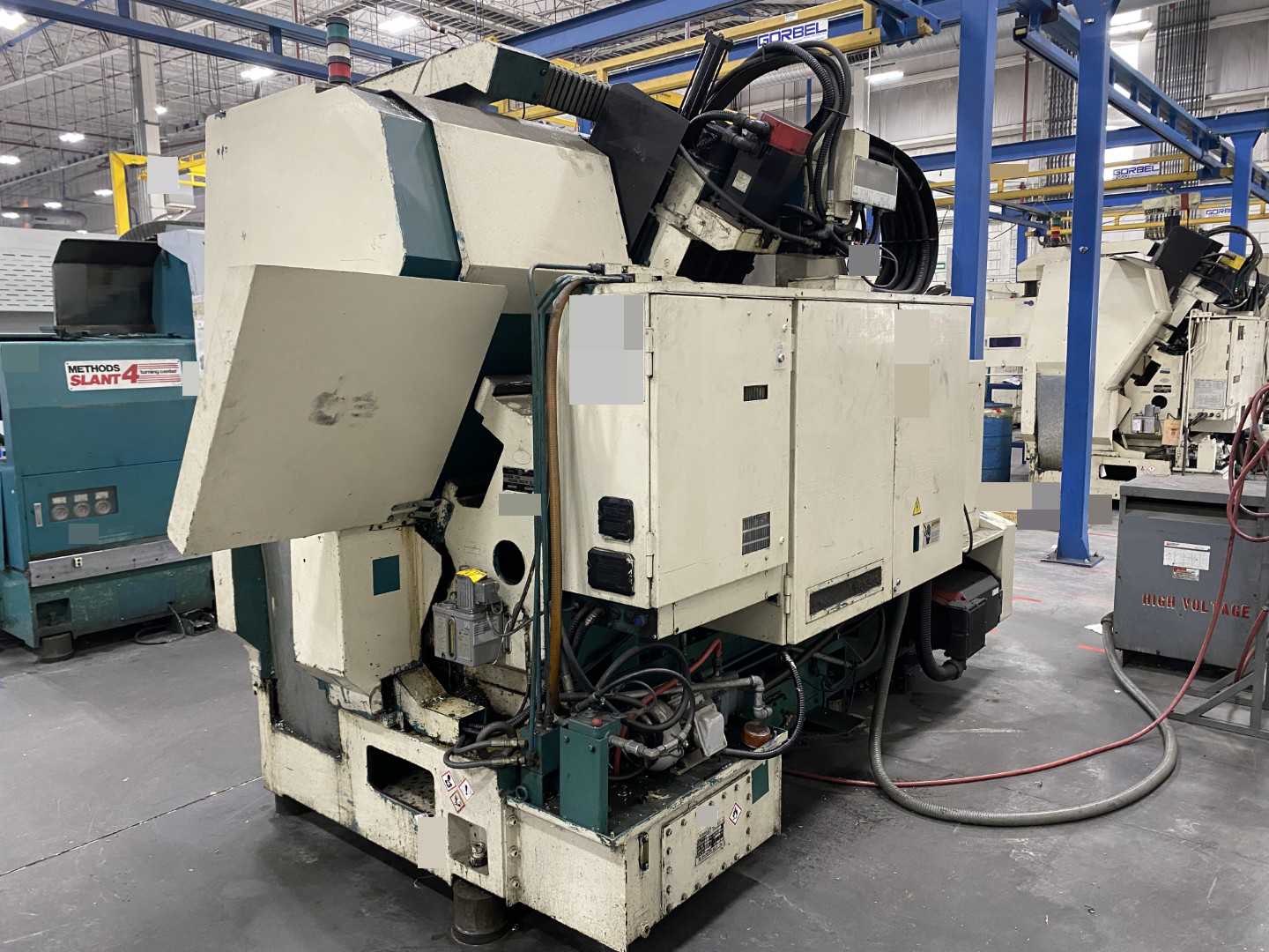 Nakamura-Tome Slant-4B CNC Horizontal Turning Center Fanuc 11T/15-T, 1992, 12" Chuck, 33.86" Swing, 20.47" Over Saddle, 18.31" Turn Dia, 63.38" Z-Travel, 10-Station Turret