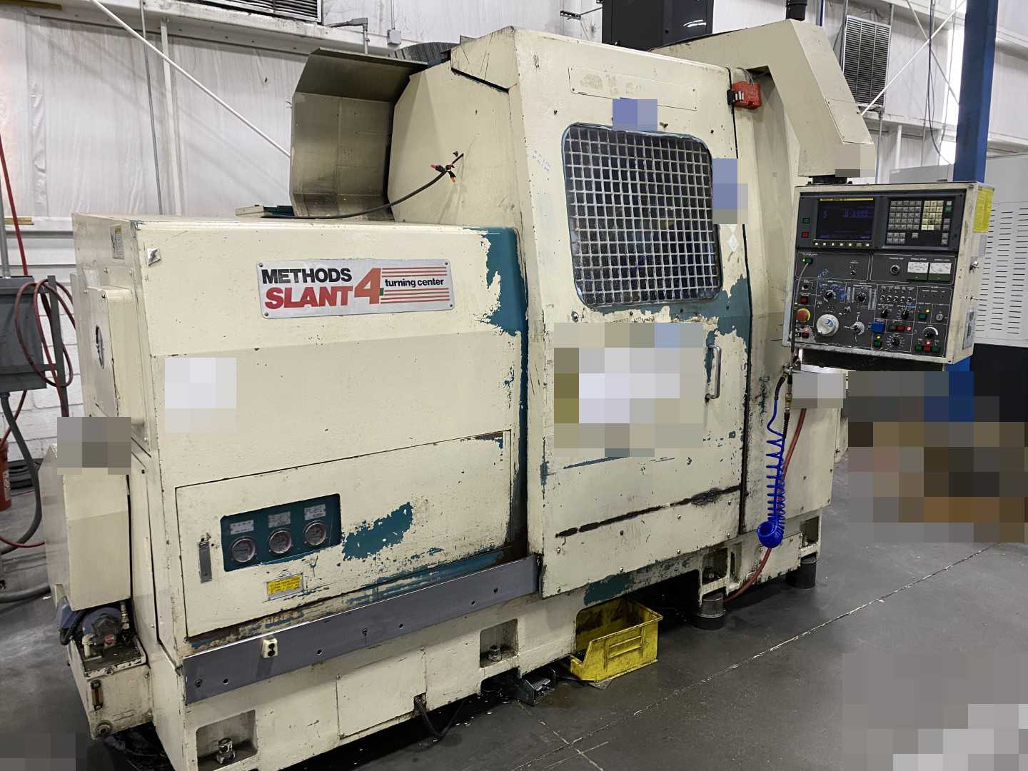 Nakamura-Tome Slant-4B CNC Horizontal Turning Center Fanuc 11T/15-T, 1992, 12" Chuck, 33.86" Swing, 20.47" Over Saddle, 18.31" Turn Dia, 63.38" Z-Travel, 10-Station Turret