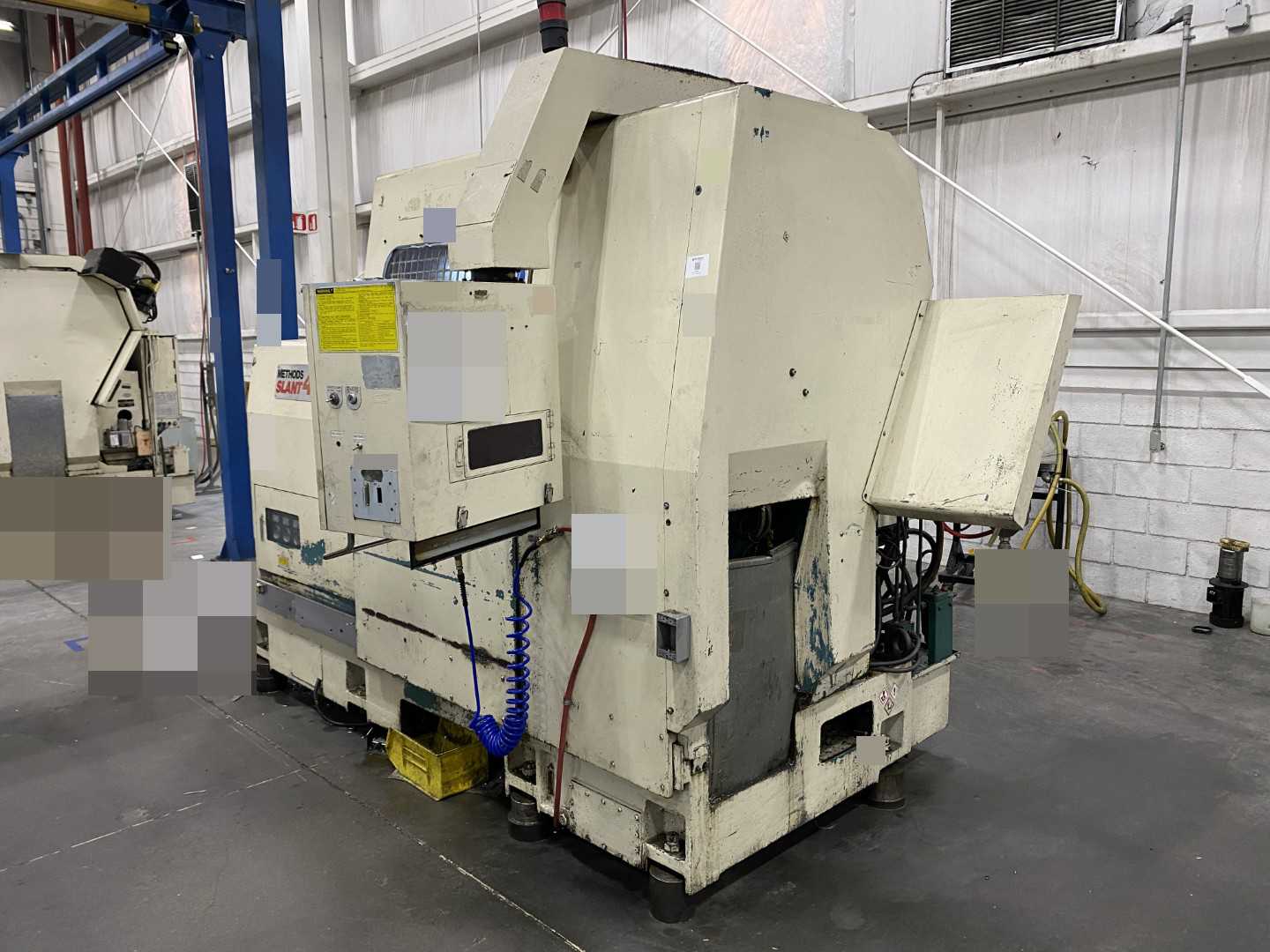 Nakamura-Tome Slant-4B CNC Horizontal Turning Center Fanuc 11T/15-T, 1992, 12" Chuck, 33.86" Swing, 20.47" Over Saddle, 18.31" Turn Dia, 63.38" Z-Travel, 10-Station Turret