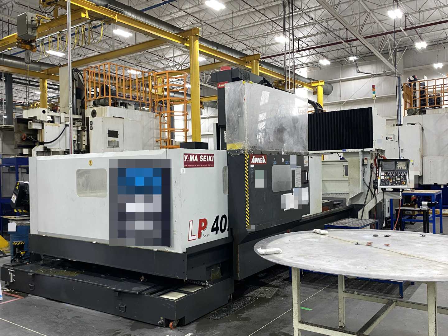 Yama Seiki (Awea) LP4025 2011 CNC Bridge Mill, Fanuc 18i-MB, 157" X-Travel, 98" Y-Travel, 158" x 94" Table, 32-ATC, 18,697 Hours