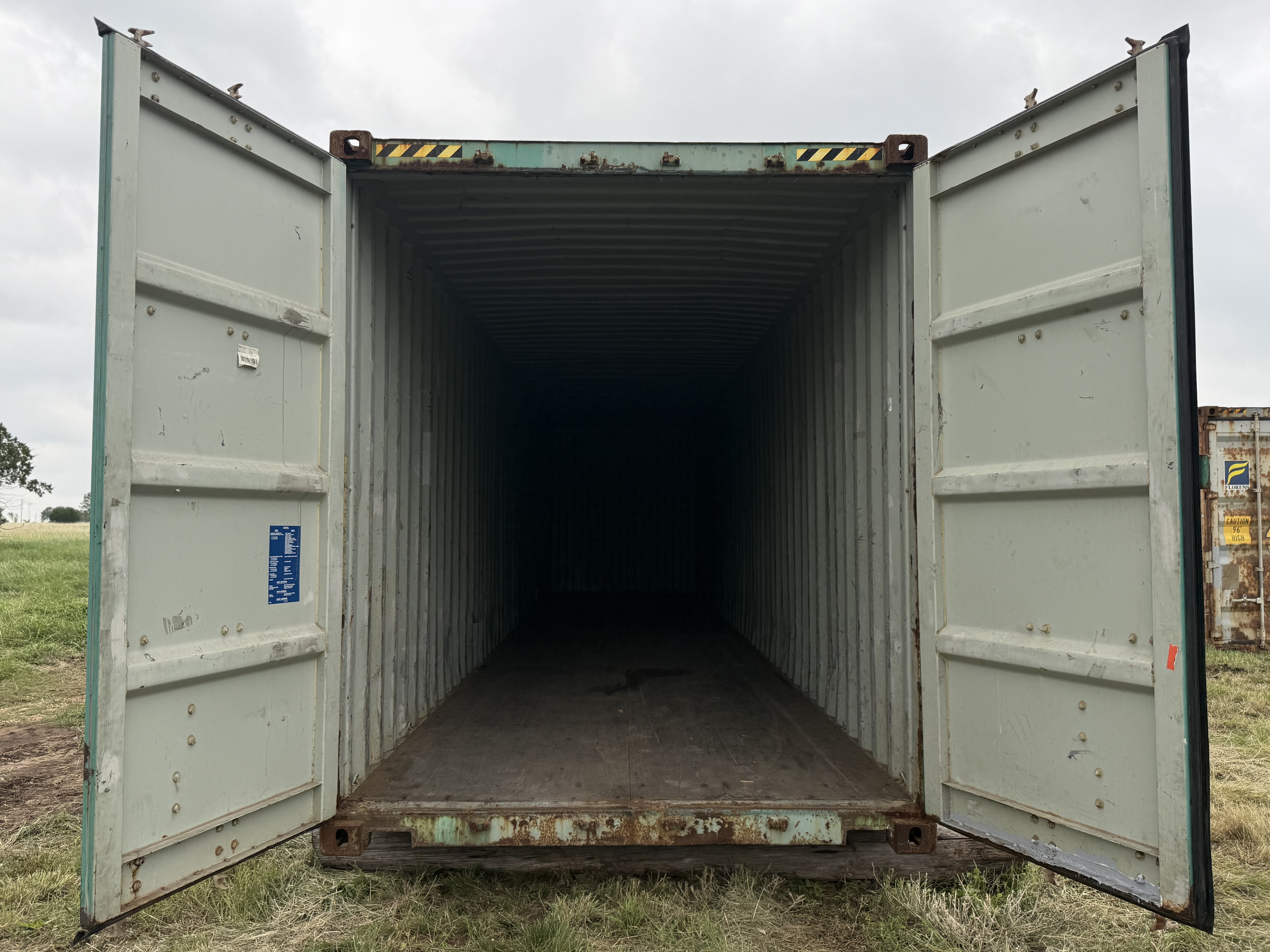 2010 USED 40' Container WIND AND WATER TIGHT, HIGH CUBE 9'6" TALL, RUST RED, 2 DOOR STD handles