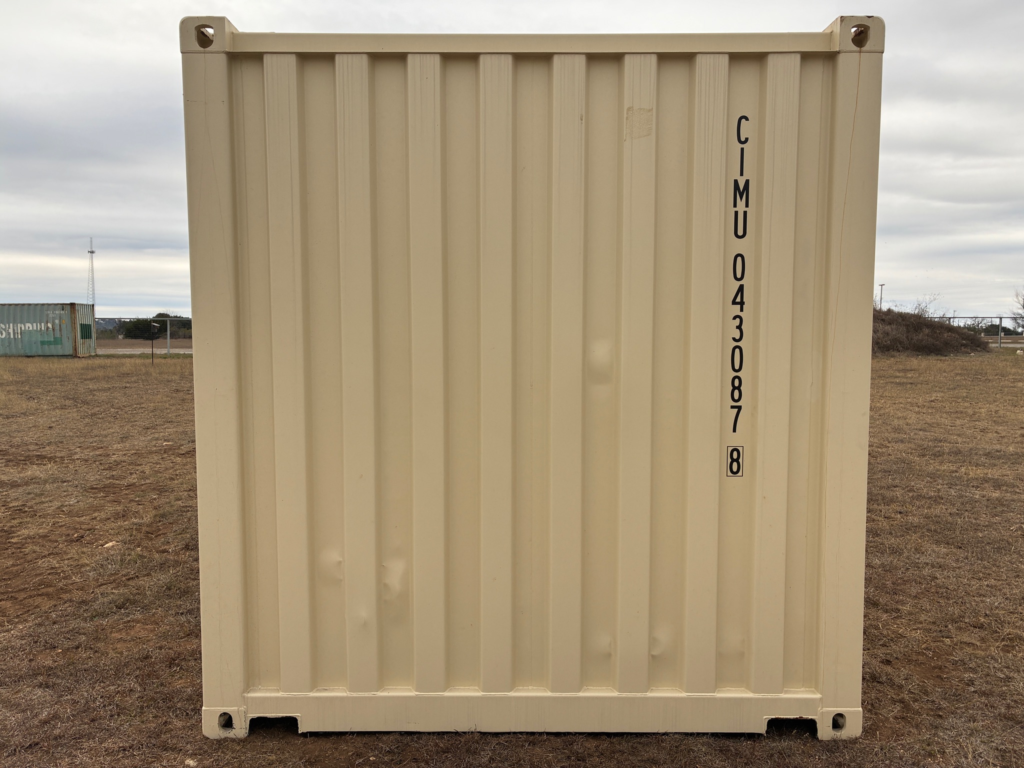 2025 - 1 trip 20ft Container TAN w/dents - 043087